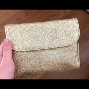 Adorable cosmetics gold bag!